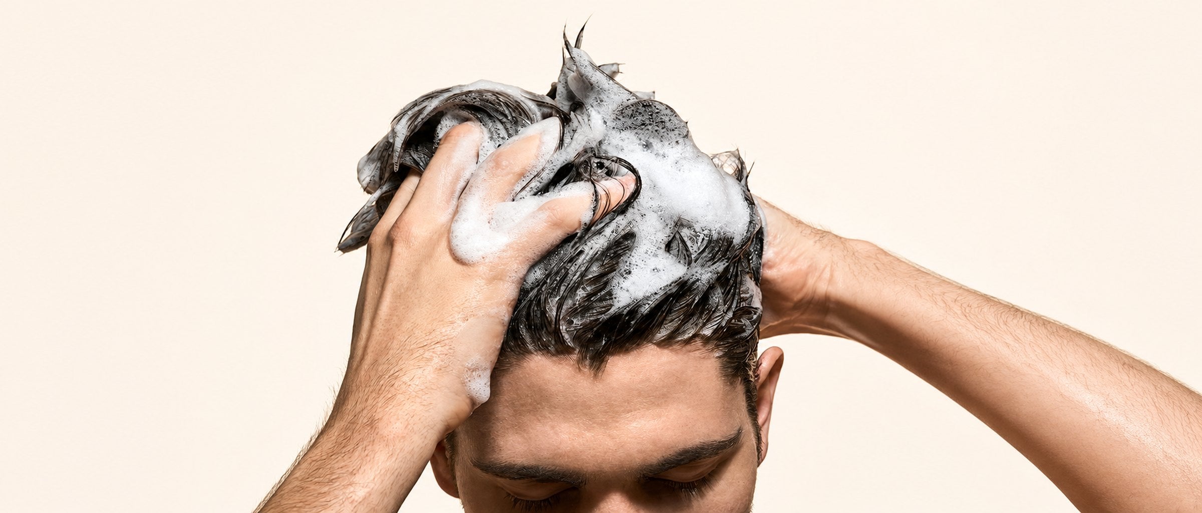 Man washing his hair